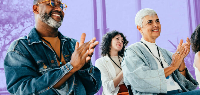 A group of donors and other supporters at a nonprofit event.