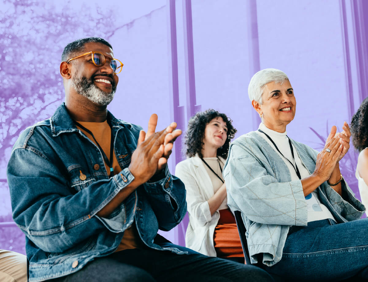 A group of donors and other supporters at a nonprofit event.