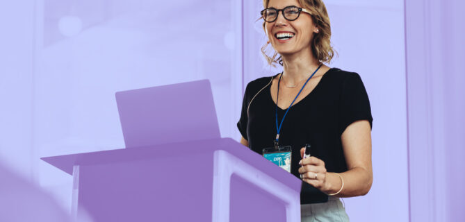 A picture of a nonprofit representative presenting their organization’s impact report.