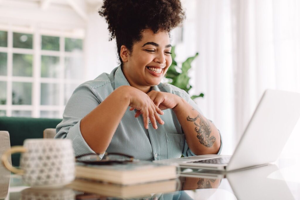 Woman having a virtual meeting on her laptop.