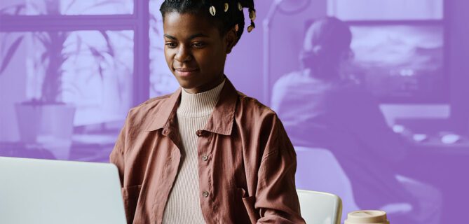 A picture of someone writing a donation request letter.