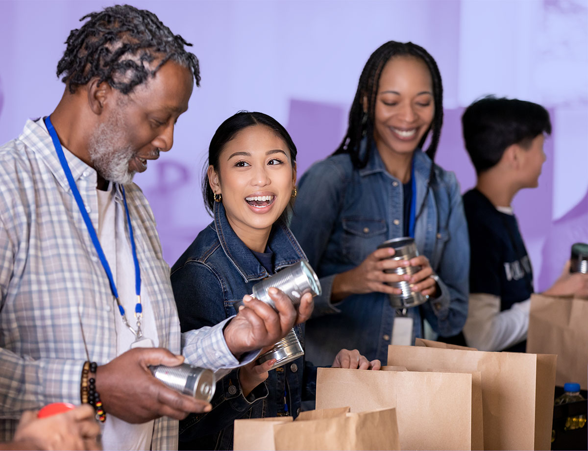 A photo of a group of people volunteering at a food pantry.
