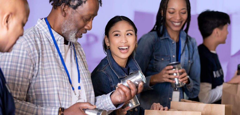 A photo of a group of people volunteering at a food pantry