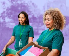 A picture of two people volunteering for a nonprofit.