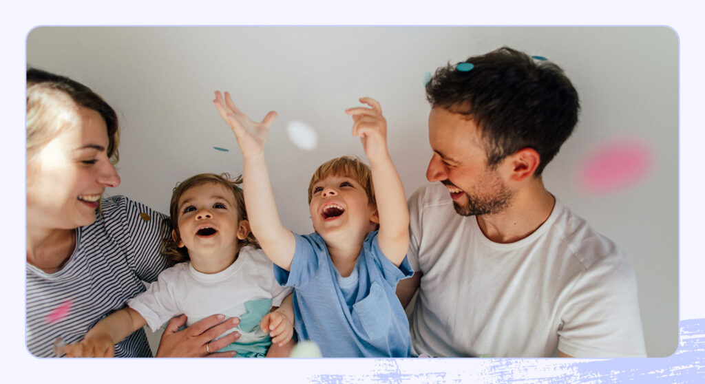 A photo of a smiling family.