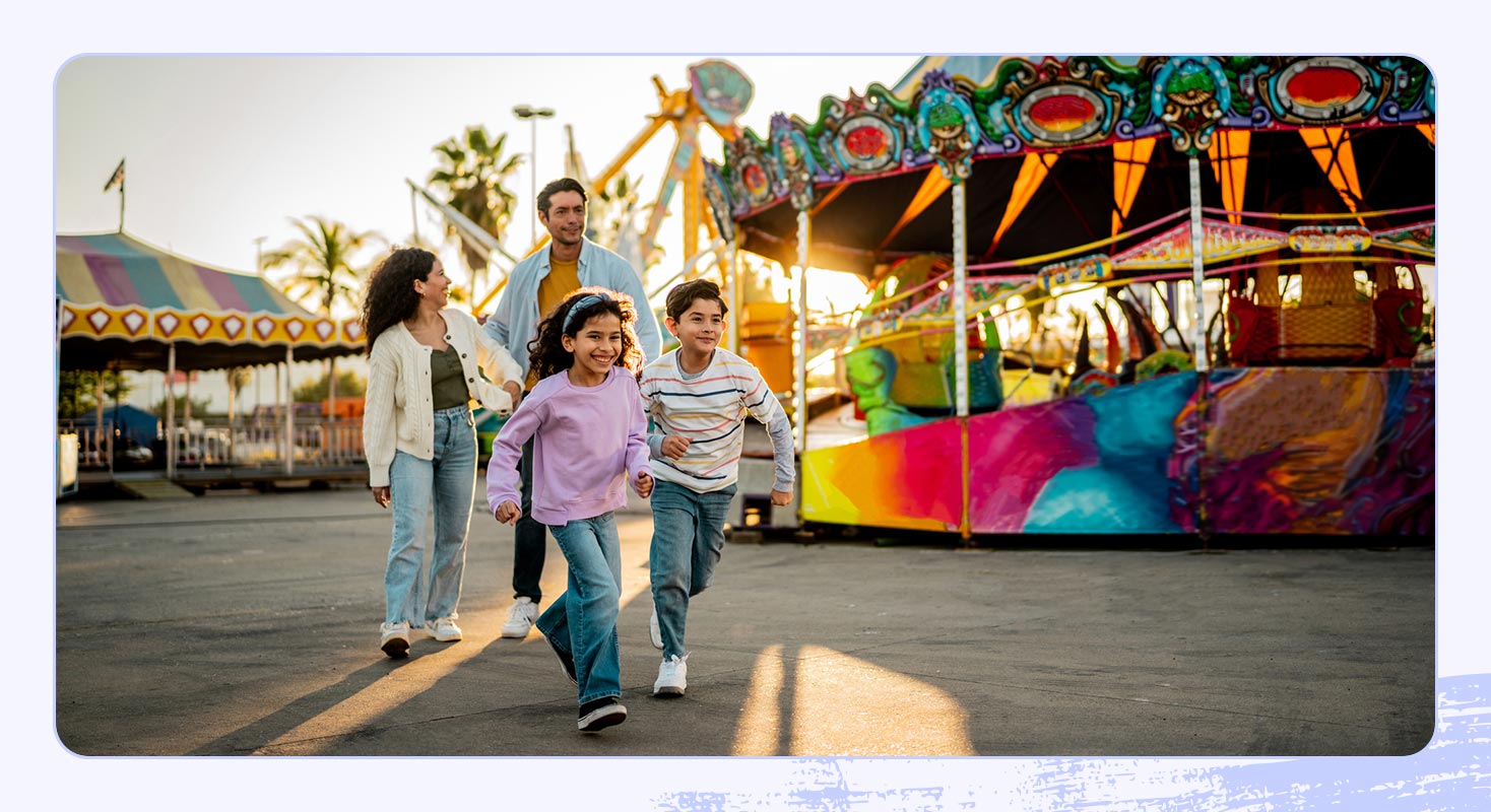 A photo of a family at an amusement park.