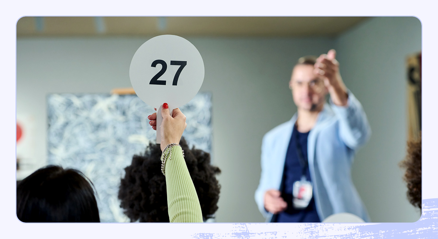 A photo of someone bidding on a desirable item from an auction.