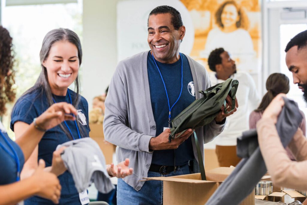 Volunteers collect donations at a drive.