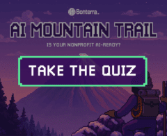 A pixel art-style illustration featuring a hiker standing on a snowy mountain ridge at dusk, gazing toward a distant peak under a purple sky. Large text at the top reads “AI MOUNTAIN TRAIL” with the subtitle “Is your nonprofit AI-ready?” Below, a glowing button with bold text says “TAKE THE QUIZ.” The Bonterra logo appears above the title, and the overall design conveys adventure, discovery, and readiness for AI transformation.