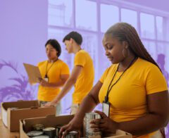 A group of employees participating in corporate philanthropy.