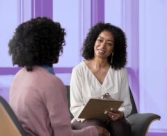 A picture of a counselor offering support thanks to a mental health nonprofit grant.