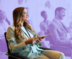 A picture of a group of nonprofit staff in a meeting discussing donor lists.
