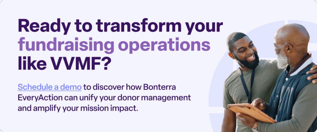 Call-to-action banner inviting organizations to schedule a demo, featuring two people reviewing information together on a tablet.