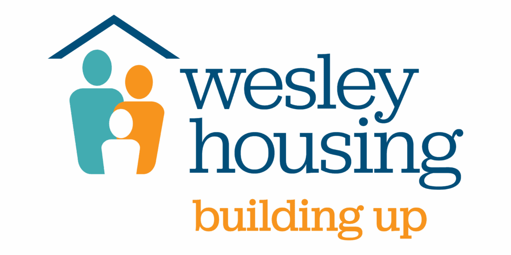 Wesley Housing logo with stylized figures under a roof and the words “wesley housing building up.”